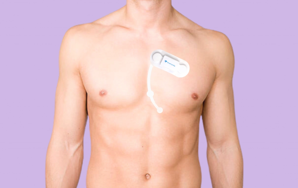 Man wearing a chest monitor device on purple background, tracking heart health.